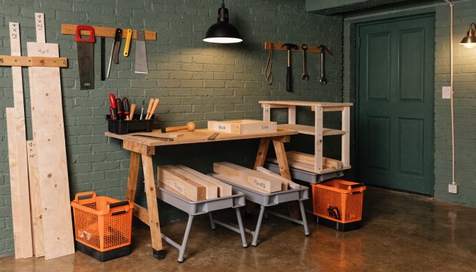 Beginner woodworking in an apartment garage with a compact bench and simple project setup